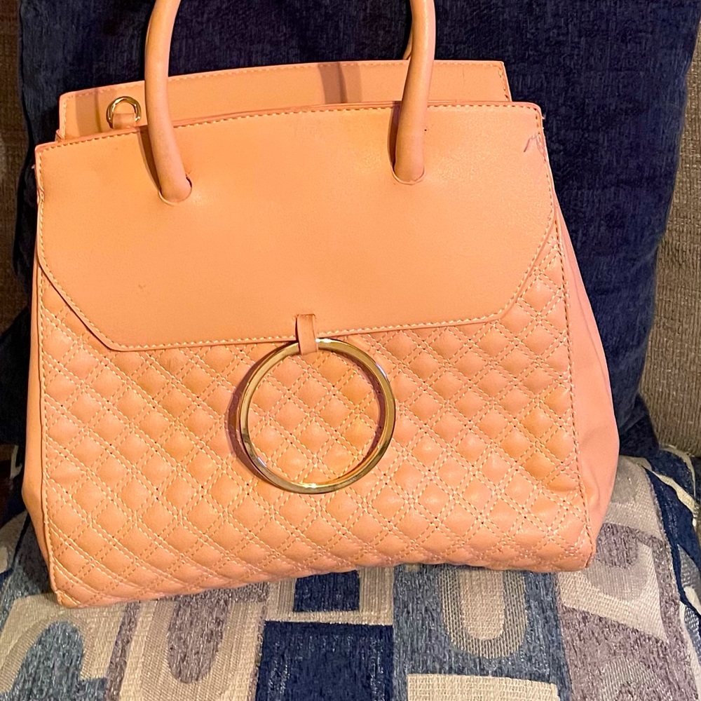 A mid size shoulder purse brand new